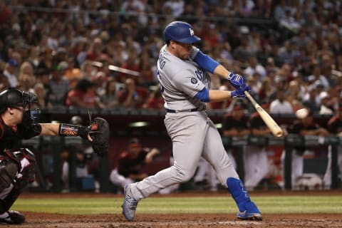 PHOENIX, ARIZONA: Jedd Gyorko #26 of the Los Angeles Dodgers hits a RBI double on August 31, 2019 in Phoenix, Arizona. (Photo by Christian Petersen/Getty Images)