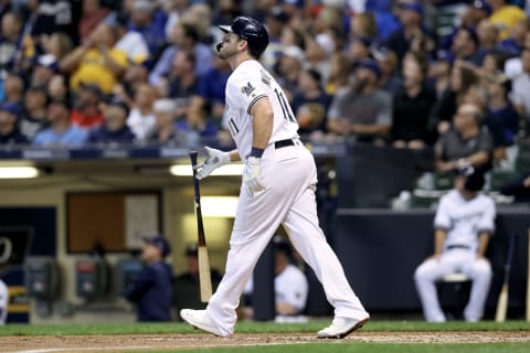 MILWAUKEE, WISCONSIN – SEPTEMBER 17: Mike  Moustakas #11 of the Milwaukee Brewers hits a home run in the seventh inning against the San Diego Padres at Miller Park on September 17, 2019 in Milwaukee, Wisconsin. (Photo by Dylan Buell/Getty Images)