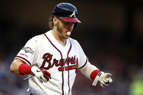 ATLANTA, GEORGIA – OCTOBER 03: Josh Donaldson #20 of the Atlanta Braves reacts after being hit by the pitch on October 03, 2019 in Atlanta, Georgia. (Photo by Todd Kirkland/Getty Images)