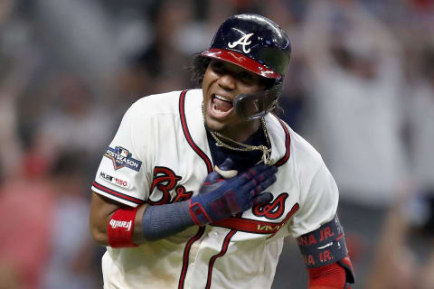 ATLANTA, GEORGIA – OCTOBER 03: Ronald  Acuna Jr. #13 of the Atlanta Braves celebrates after he hits a two-run home run against the St. Louis Cardinals during the ninth inning in game one of the National League Division Series at SunTrust Park on October 03, 2019 in Atlanta, Georgia. (Photo by Todd Kirkland/Getty Images)