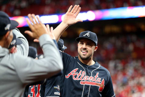 ST LOUIS, MISSOURI – OCTOBER 06: Adam Duvall #23 of the Atlanta Braves celebrates with his teammates. (Photo by Jamie Squire/Getty Images)