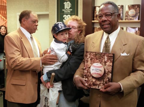 From 1999: Atlanta Braves icon Hank Aaron with Willie Mays. (Photo by DOUG KANTER/AFP via Getty Images)