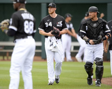 Guys the Atlanta Braves won’t want to see: Yasmani Grandal and Michael Kopech of the Chicago White Sox. (Photo by Ron Vesely/Getty Images)