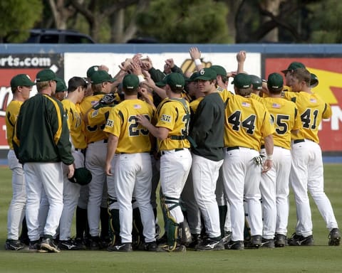 The Baylor Bears celebrate as they defeated the Long Beach State Dirtbags 4 to 2 on March 5, 2006 at Blair Field in Long Beach, California. (Photo by Reuben Canales/Getty Images)