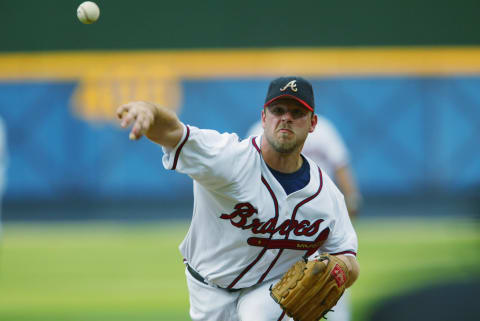 ATLANTA – JULY 31: Starting Pitcher Kevin Milllwood #34 of the Atlanta Braves throws against the Milwaukee Brewers on July 31, 2002 at Turner Field in Atlanta, Georgia. The Braves defeated the Brewers 9-1. (Photo by Jammie Squire/Getty Images)