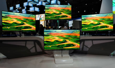 LAS VEGAS, NV – JANUARY 10: Samsung 55-inch super OLED televisions are displayed at the company’s booth at the 2012 International Consumer Electronics Show at the Las Vegas Convention Center January 10, 2012 in Las Vegas, Nevada.  (Photo by Ethan Miller/Getty Images)