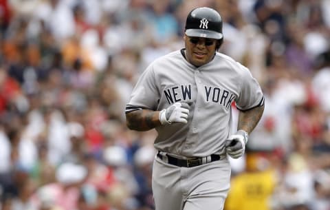 BOSTON, MA – JULY 7: Andruw Jones #22 of the New York Yankees runs out a home run during the first inning of game one of a doubleheader against the Boston Red Sox at Fenway Park on July 7, 2012 in Boston, Massachusetts. (Photo by Winslow Townson/Getty Images)