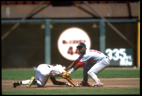 30 APR 1992: ST. LOUIS CARDINALS INFIELDER GERALD PERRY TAGS OUT SAN FRANCISCO GIANTS SHORTSTOP ROYCE CLAYTON BEFORE REACHING SECOND BASE IN GIANTS GAME AT CANDLESTICK PARK IN SAN FRANCISCO, CALIFORNIA.