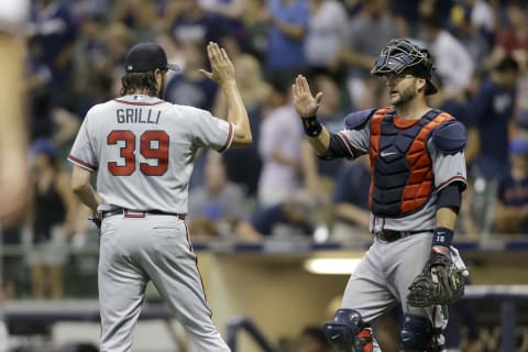 MILWAUKEE, WI – JULY 06: Jason Grilli #39 of the Atlanta Braves celebrates with A.J. Pierzynski #15 after the 5-3 win over the Milwaukee Brewers at Miller Park on July 06, 2015 in Milwaukee, Wisconsin. (Photo by Mike McGinnis/Getty Images)