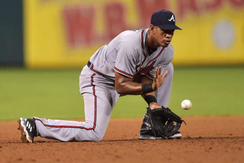 PHILADELPHIA, PA – SEPTEMBER 07: Hector Olivera #28 of the Atlanta Braves fields a ground ball in the fourth inning against the Philadelphia Phillies at Citizens Bank Park on September 7, 2015 in Philadelphia, Pennsylvania. The Braves won 7-2. (Photo by Drew Hallowell/Getty Images)