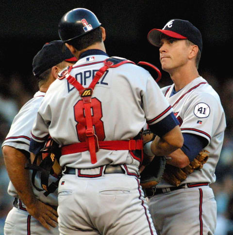 Atlanta Braves pitchers often have interesting looks on their faces when listening to Leo Mazzone. (Photo credit DOUG KANTER/AFP via Getty Images)