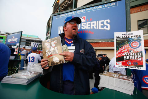 NEED A PROGRAM TO TELL THE PLAYERS?  CHICAGO, IL: A vendor sells programs before Game Three of the 2016 World Series between the Chicago Cubs and the Cleveland Indians at Wrigley Field on October 28, 2016 in Chicago, Illinois. (Photo by Jamie Squire/Getty Images)