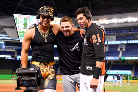 MIAMI, FL – APRIL 12: Giancarlo Stanton and Christian Yelich of the Miami Marlins are joined by Freddie Freeman of the Atlanta Braves while being interviewed for the MLB Network show Intentional Talk on April 12, 2017. (Photo by Rob Foldy/Miami Marlins via Getty Images)