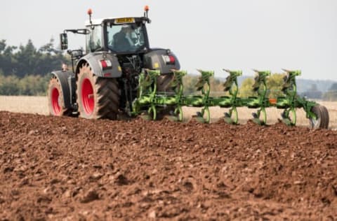 TAUNTON, ENGLAND – OCTOBER 15: A modern tractor is used to plough a field at the 67th British National Ploughing Championships at Bishop’s Lydeard near Taunton on October 15, 2017 in Somerset, England. With the agricultural industry facing an uncertain future post-Brexit, the annual event which is held in a different part of the country each year offers, with displays by heavy horses, vintage tractors and steam ploughing engines, a rare glimpse into traditional farming and the changes that have occurred over the past three hundred years. (Photo by Matt Cardy/Getty Images)