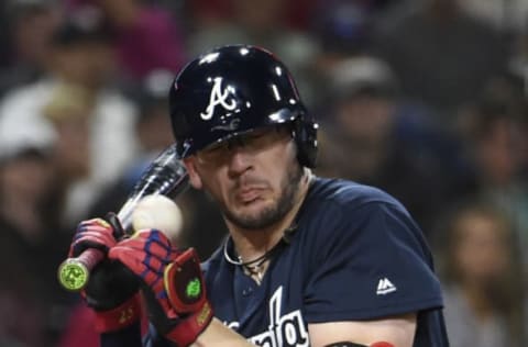 SAN DIEGO, CA – JUNE 28: Tyler Flowers #25 of the Atlanta Braves is hit with a pitch during the sixth inning of a baseball game against the San Diego Padres at PETCO Park on June 28, 2017 in San Diego, California. (Photo by Denis Poroy/Getty Images)