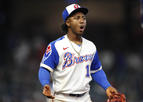 Ozzie Albies #1 of the Atlanta Braves reacts after a replay was called in favor of Alec Bohm of the Philadelphia Phillies. (Photo by Todd Kirkland/Getty Images)