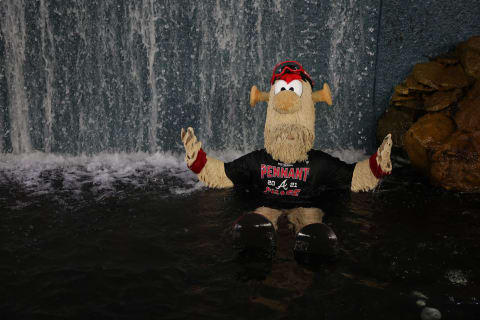 Even Blooper celebrates the Atlanta Braves’ NLDS victory… but how do you dry out afterwards? (Photo by Kevin C. Cox/Getty Images)