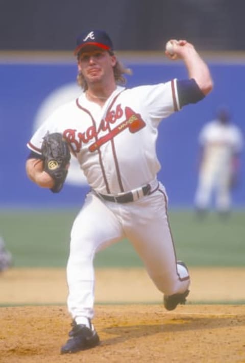 Mike Stanton #30 of the Atlanta Braves pitches, circa 1991, at Atlanta-Fulton County Stadium. (Photo by Focus on Sport/Getty Images)