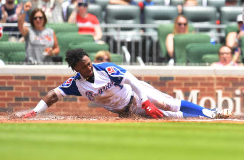 ATLANTA, GA – JUNE 24: Ozzie Albies #1 of the Atlanta Braves touches home plate to score a first inning run against the Baltimore Orioles at SunTrust Park on June 24, 2018 in Atlanta, Georgia. (Photo by Scott Cunningham/Getty Images)