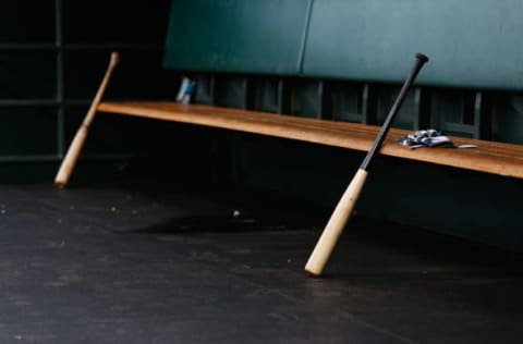 SAN FRANCISCO, CA – MAY 29: A bat and gloves in the Atlanta Braves dugout before the game against the San Francisco Giants at AT&T Park on May 29, 2015 in San Francisco, California. (Photo by Lachlan Cunningham/Getty Images)