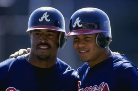 9 Mar 1999: Outfielder Brian Jordan #33 (L) of the Atlanta Braves poses with teammate Andruw Jones #25 (R) during the Spring Training game against the New York Mets at the Disney”s Wide World of Sports Complex in Kissimmee, Florida. The Mets defeated the Braves 9-3. Mandatory Credit: Andy Lyons /Allsport