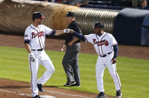 ATLANTA, GA – MAY 12: Pinch hitter Jeff Francoeur #18 of the Atlanta Braves fist bumps first base coach Terry Pendleton #9 after hitting a game-tying RBI single in the seventh inning during the game against the Philadelphia Phillies at Turner Field on May 12, 2016 in Atlanta, Georgia. (Photo by Mike Zarrilli/Getty Images)