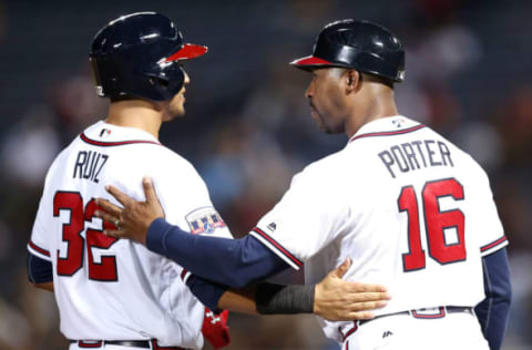 ATLANTA, GA – SEPTEMBER 28: Third base coach Bo Porter #16 congratulates third baseman Rio Ruiz #32 of the Atlanta Braves on at triple, Ruiz’s first Major League hit in the eighth inning during the game against the Philadelphia Phillies at Turner Field on September 28, 2016 in Atlanta, Georgia. (Photo by Mike Zarrilli/Getty Images)