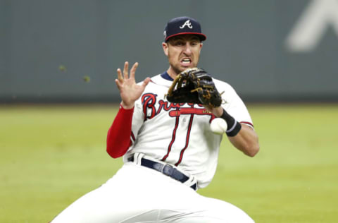 ATLANTA, GA – SEPTEMBER 07: Left fielder Lane Adams #16 of the Atlanta Braves dives late for a ball hit by Ichiro Suzuki #51 of the Miami Marlins (not pictured) in the eighth inning during the game at SunTrust Park on September 7, 2017 in Atlanta, Georgia. (Photo by Mike Zarrilli/Getty Images)