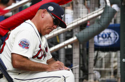 ATLANTA, GA – SEPTEMBER 24: Brian Snitker, manager of the Atlanta Braves watches on in the fifth inning of an MLB game against the Philadelphia Phillies at SunTrust Park on September 24, 2017 in Atlanta, Georgia. The Philadelphia Phillies won the game 2-0. (Photo by Todd Kirkland/Getty Images)