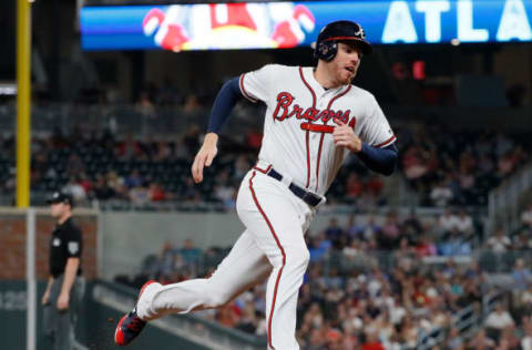 ATLANTA, GA – SEPTEMBER 19: Freddie Freeman #5 of the Atlanta Braves rounds third base on the way to score on a RBI single hit by Kurt Suzuki #24 at SunTrust Park on September 19, 2017 in Atlanta, Georgia. (Photo by Kevin C. Cox/Getty Images)