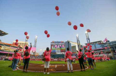 ATLANTA, GA – SEPTEMBER 23: The Atlanta Braves have a breast cancer awareness recognizing survivors in a pregame ceremony prior to an MLB game against the Philadelphia Phillies at SunTrust Park on September 23, 2017 in Atlanta, Georgia. (Photo by Todd Kirkland/Getty Images)