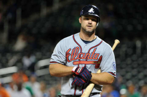 NEW YORK, NY – SEPTEMBER 08: David Ross #8 of the Atlanta Braves walks back to the dugout after striking out swinging to end the top of the sixth inning against the New York Mets at Citi Field on September 8, 2011 in the Flushing neighborhood of the Queens borough of New York City. (Photo by Christopher Pasatieri/Getty Images)