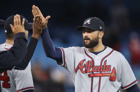 TORONTO, ON – MAY 15: Nick Markakis #22 of the Atlanta Braves celebrates their victory with teammates during MLB game action against the Toronto Blue Jays at Rogers Centre on May 15, 2017 in Toronto, Canada. (Photo by Tom Szczerbowski/Getty Images)