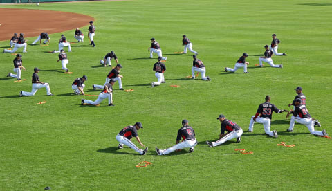 The Atlanta Braves stretch. (Photo by Mike Ehrmann/Getty Images)