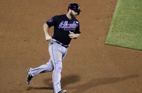 PITTSBURGH, PA – AUGUST 19: Evan Gattis #24 of the Atlanta Braves rounds third after hitting a solo home run making the score 11-2 in the top half of the ninth inning against the Pittsburgh Pirates during the game at PNC Park on August 19, 2014 in Pittsburgh, Pennsylvania. (Photo by Justin K. Aller/Getty Images)