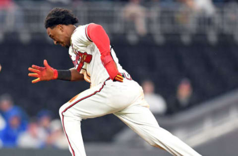 ATLANTA, GA – APRIL 19: Ozzie Albies #1 of the Atlanta Braves advances to third base in the first inning against the New York Mets at SunTrust Park on April 19, 2018 in Atlanta, Georgia. (Photo by Scott Cunningham/Getty Images)