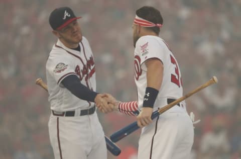 WASHINGTON, DC – JULY 16: Freddie Freeman of the Atlanta Braves and Bryce Harper #34 shake hands during the T-Mobile Home Run Derby at Nationals Park on July 16, 2018 in Washington, DC. (Photo by Patrick Smith/Getty Images)