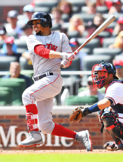 ATLANTA, GA – SEPTEMBER 3: Mookie Betts #50 of the Boston Red Sox knocks in a run with a fifth inning single against the Atlanta Braves at SunTrust Park on September 3, 2018 in Atlanta, Georgia. (Photo by Scott Cunningham/Getty Images)