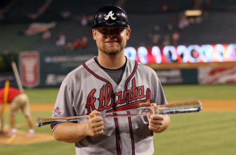 National League All-Star Brian McCann #16 of the Atlanta Braves poses with the MVP trophy after the 81st MLB All-Star Game. (Photo by Stephen Dunn/Getty Images)