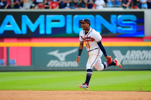 ATLANTA, GA – SEPTEMBER 22: Ronald  Acuna Jr. #13 of the Atlanta Braves celebrates after clinching the NL East Division against the Philadelphia Phillies at SunTrust Park on September 22, 2018 in Atlanta, Georgia. (Photo by Daniel Shirey/Getty Images)