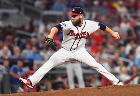 ATLANTA, GA – OCTOBER 07: A.J.  Minter #33 of the Atlanta Braves pitches in the eighth inning against the Los Angeles Dodgers during Game Three of the National League Division Series at SunTrust Park on October 7, 2018 in Atlanta, Georgia. (Photo by Scott Cunningham/Getty Images)