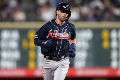 DENVER, COLORADO – APRIL 09: Dansby Swanson #7 of the Atlanta Braves circles the bases after hitting a 3 RBI home run in the fourth inning against the Colorado Rockies at Coors Field on April 09, 2019 in Denver, Colorado. (Photo by Matthew Stockman/Getty Images)