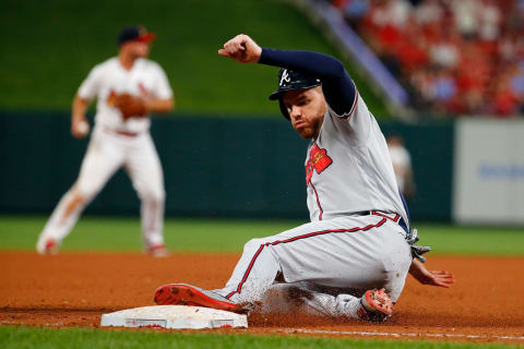 ST LOUIS, MO – MAY 26: Freddie Freeman #5 of the Atlanta Braves slides safely into third base to set up the game winning run against the St. Louis Cardinals in the tenth inning at Busch Stadium on May 26, 2019 in St Louis, Missouri. (Photo by Dilip Vishwanat/Getty Images)