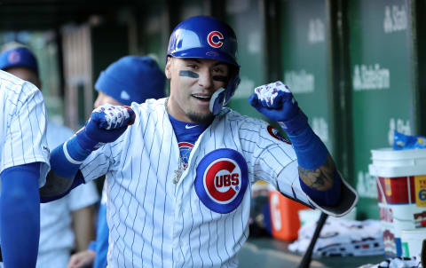 CHICAGO, ILLINOIS – MAY 04: Javier Baez #9 of the Chicago Cubs celebrates in the dugout following his game winning home run during the eighth inning of a game against the St. Louis Cardinals at Wrigley Field on May 04, 2019 in Chicago, Illinois. (Photo by Nuccio DiNuzzo/Getty Images)