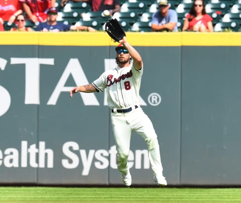 ATLANTA, GA – JULY 7: Charlie Culberson #8 of the Atlanta Braves makes a running catch to start a double play with his throw to home plate against the Miami Marlins in the ninth inning at SunTrust Park on July 7, 2019 in Atlanta, Georgia. (Photo by Scott Cunningham/Getty Images)