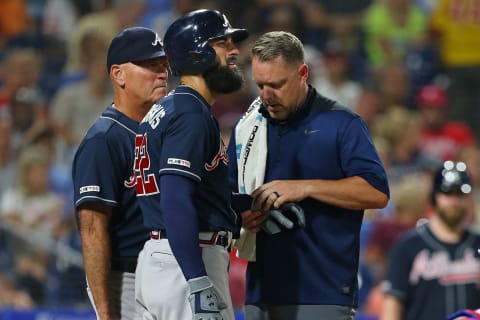 PHILADELPHIA, PA – JULY 26: Nick Markakis #22 of the Atlanta Braves is looked at after getting hit in the hand by a pitch during the sixth inning of a game against the Philadelphia Phillies on July 26, 2019. The Braves won 9-2. (Photo by Rich Schultz/Getty Images)