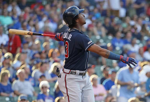 CHICAGO, ILLINOIS – JUNE 25: Ronald Acuna Jr. #13 of the Atlanta Braves hits a first pitch, lead-off home run in the 1st inning against the Chicago Cubs at Wrigley Field on June 25, 2019 in Chicago, Illinois. (Photo by Jonathan Daniel/Getty Images)