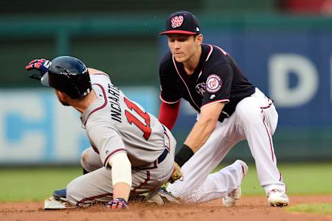 WASHINGTON, DC – JULY 30: Ender Inciarte #11 of the Atlanta Braves is safe at second base against Trea Turner #7 of the Washington Nationals on a pickoff attempt in the second inning at Nationals Park on July 30, 2019 in Washington, DC. (Photo by Patrick McDermott/Getty Images)