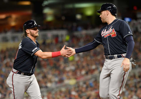 MINNEAPOLIS, MN – AUGUST 06: Josh Donaldson #20 and Freddie Freeman #5 of the Atlanta Braves celebrate scoring runs against the Minnesota Twins during the sixth inning of the interleague game on August 6, 2019 at Target Field in Minneapolis, Minnesota. The Braves defeated the Twins 12-7. (Photo by Hannah Foslien/Getty Images)