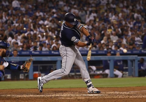 The Atlanta Braves might look to acquire Hunter Renfroe – seen here hitting a solo home run against the Los Angeles Dodgers at Dodger Stadium – to reinforce their roster for the postseason. (Photo by Victor Decolongon/Getty Images). (Photo by Victor Decolongon/Getty Images)